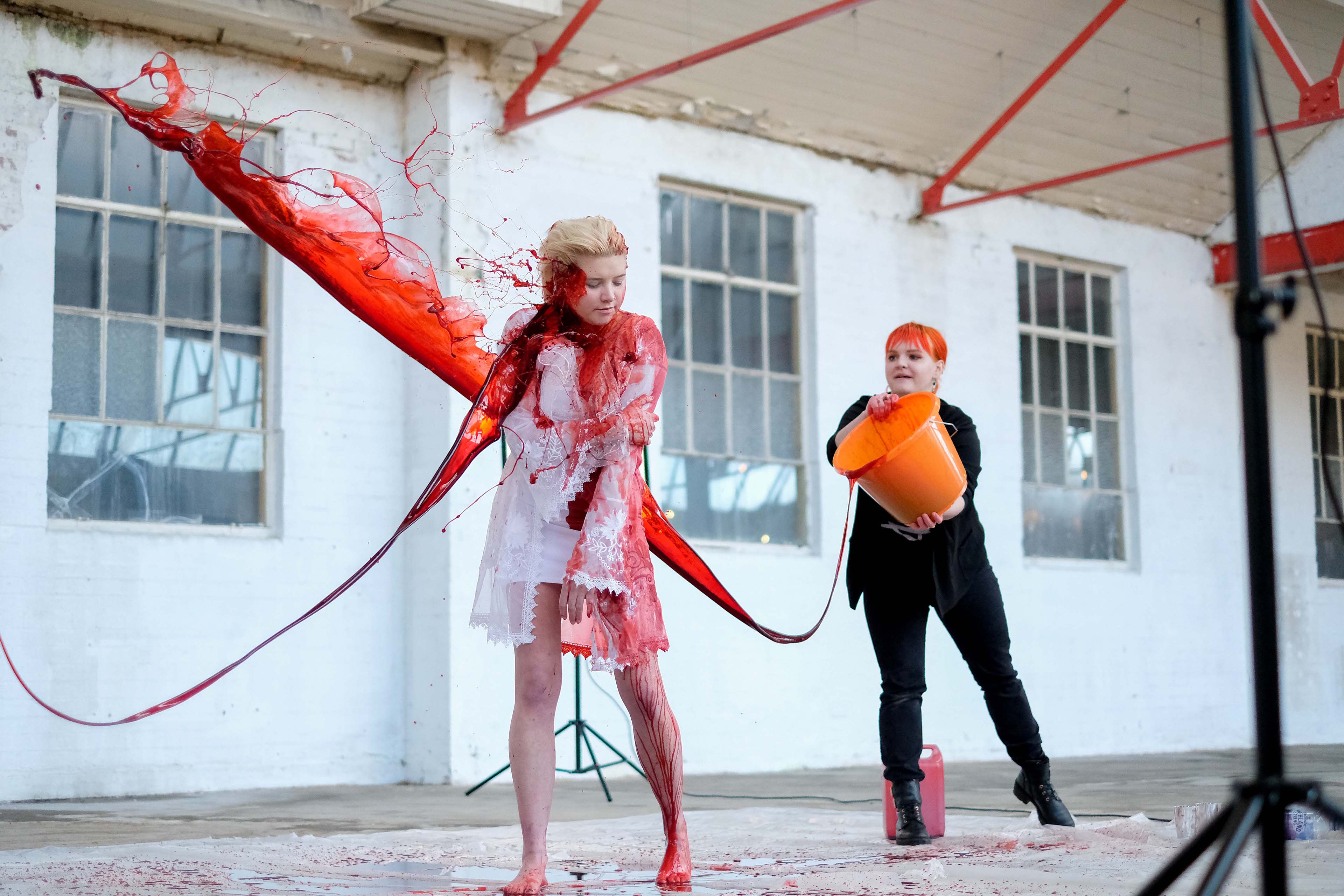 Behind the scenes - pouring stage blood on model